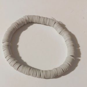I’m selling a gray clay bead bracelet that I have made